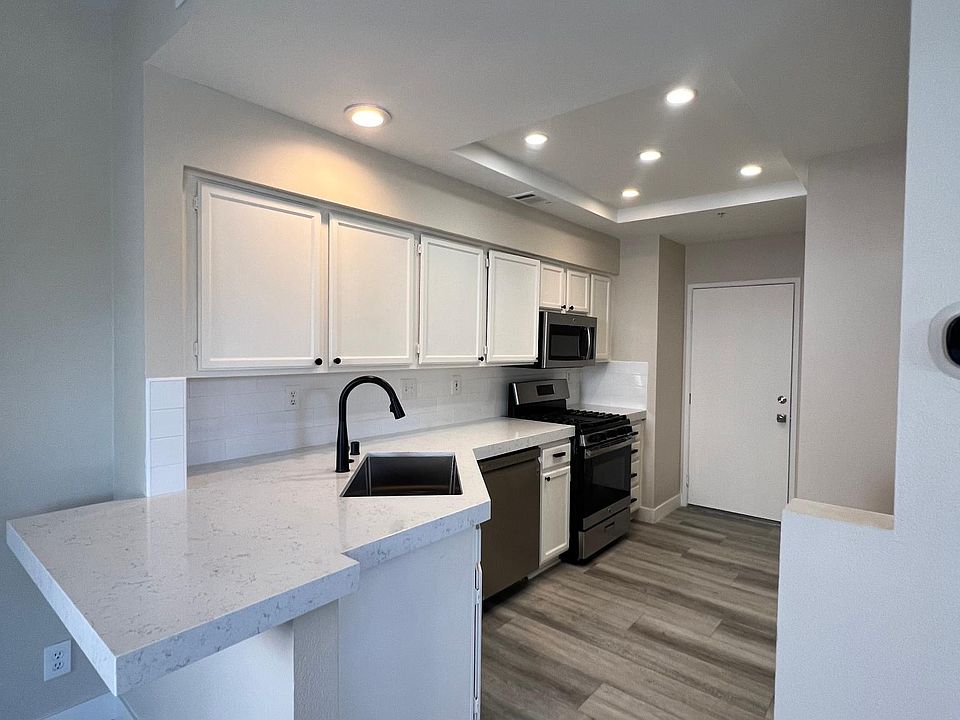 Newly remodeled kitchen with quartz countertops
