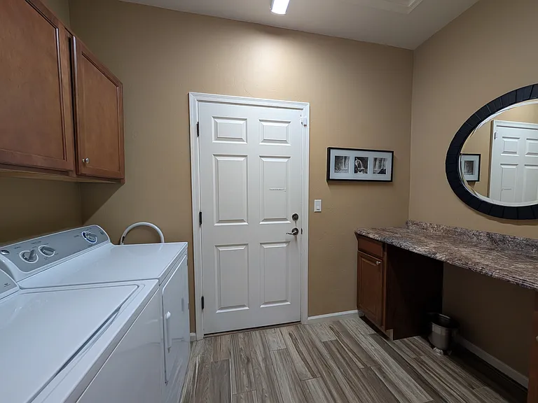 Laundry room with folding table