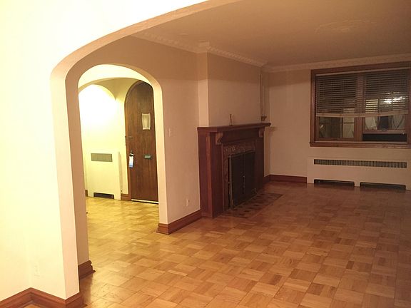 View inside front door / foyer and living room