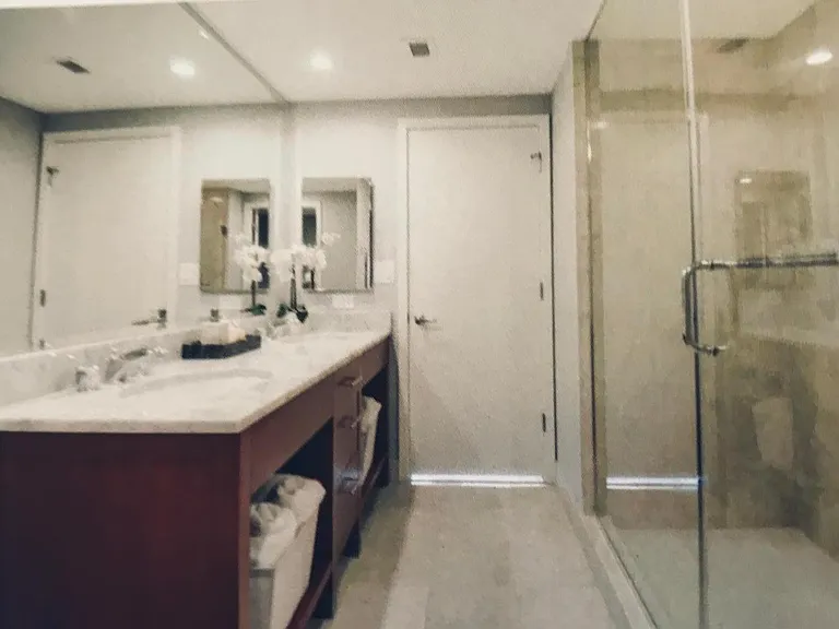 master bath with two sinks and large walk in shower