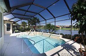 pool area with spa on water
