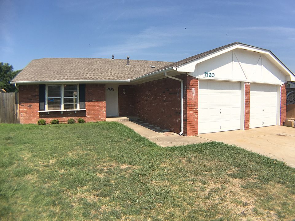 Adorable front curb appeal and large front and back yard.