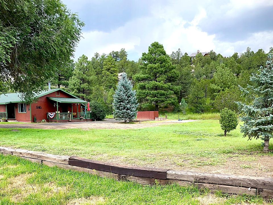 Side door street view and back side of the property.