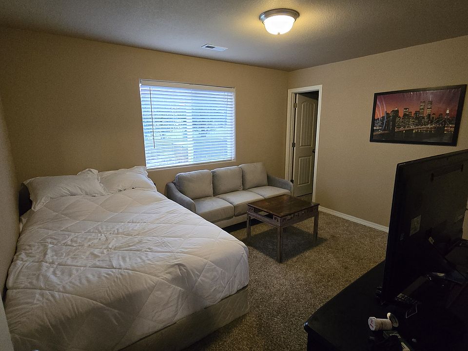 Available room- 11' x 13'. The window faces the north & overlooks the backyard, pretty trees, and a large field/old ranch.