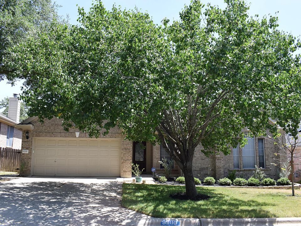 Exterior, front yard and driveway