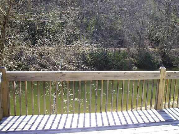 House sits 50' from River