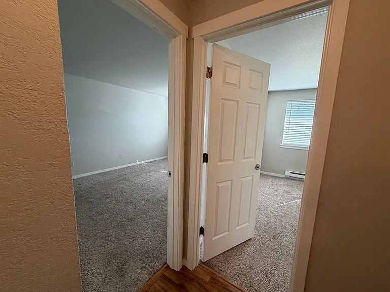 primary bedroom on left and second bedroom/office on right
