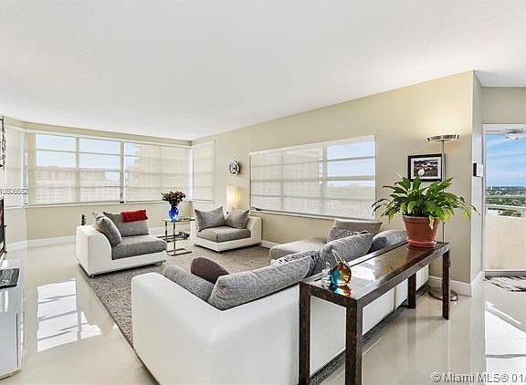 HUGE LIVING AREA ....ELECTRONIC SHADES THROUGHOUT LIVING AND DINING AREAS