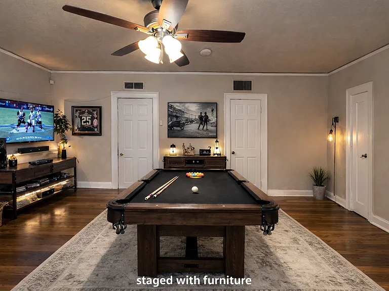 Big additional game room/den with door to backyard