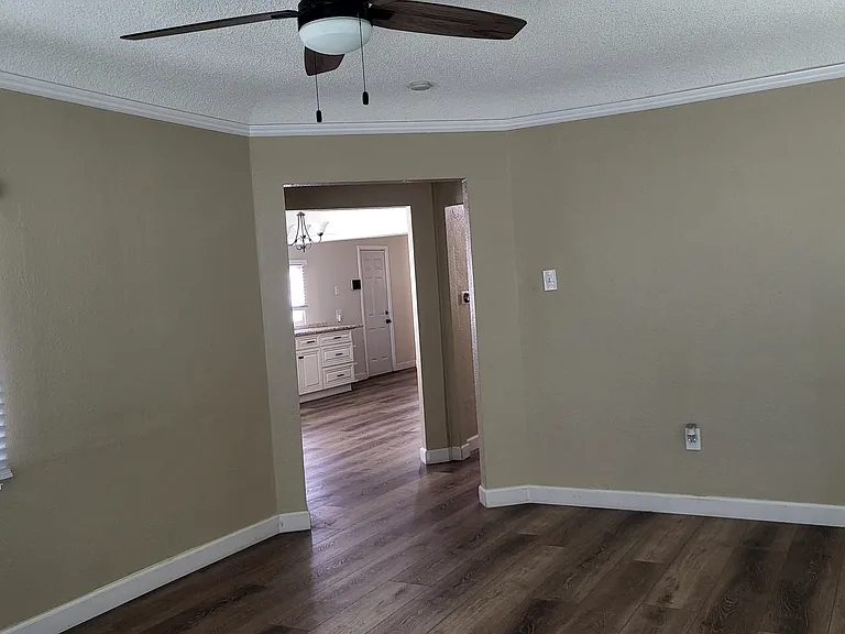 Spacious Living Room with Ceiling Fan
