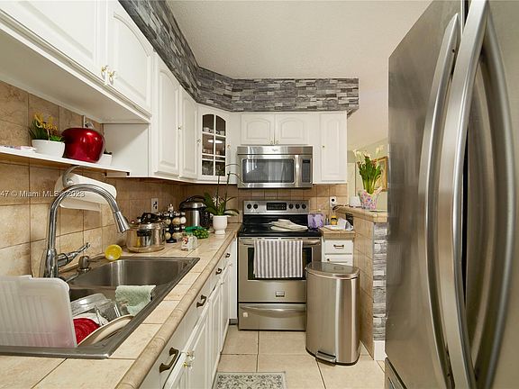 5th image of 1695 W 42nd St APT 102
