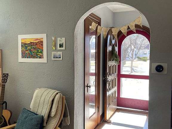 Front door and coat closet