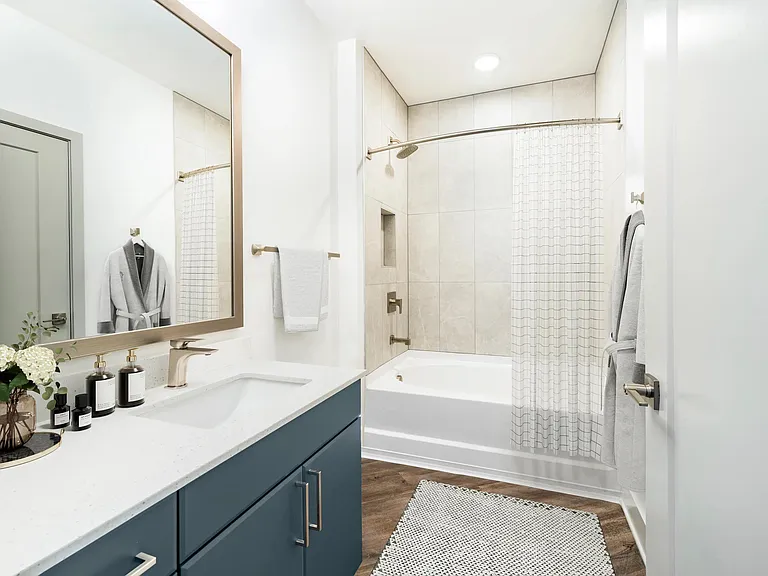 Thoughtful bathroom design at Modera Westside Trail pairs clean finishes with a spacious layout for a polished, comfortable retreat.