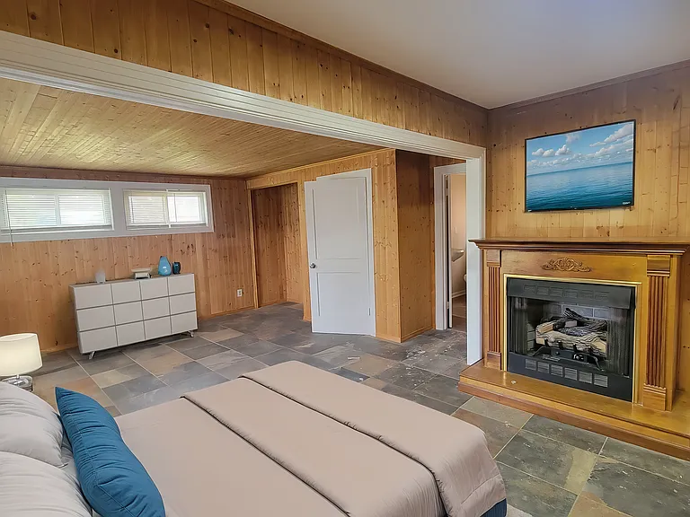 Gas burning fireplace with lots of natural lighting