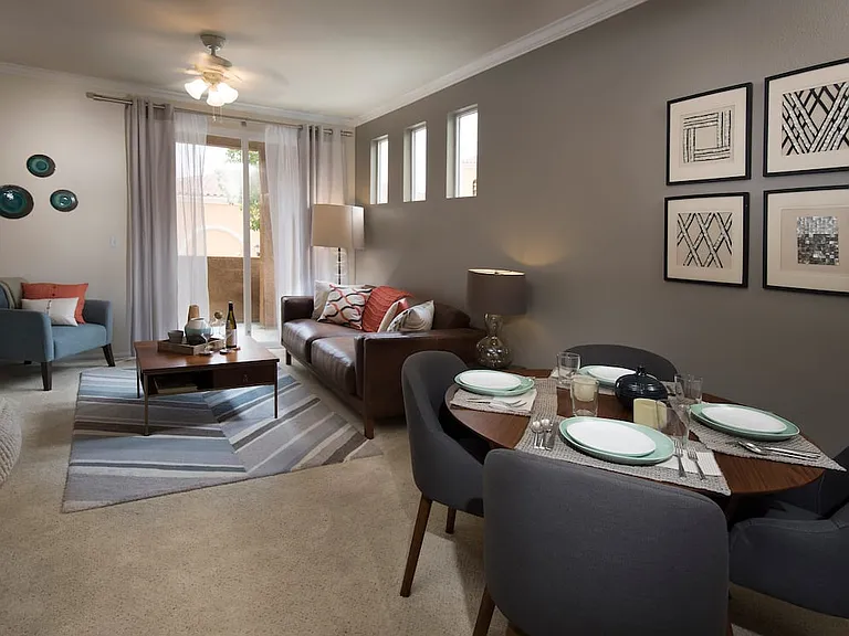 Classic Package I dining and living area with carpeting