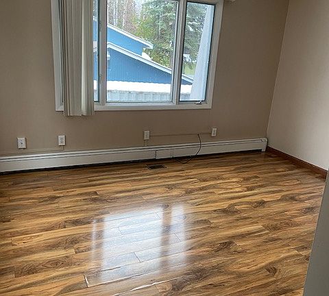 The upstairs living space is one of two living rooms or flex spaces in the unit!