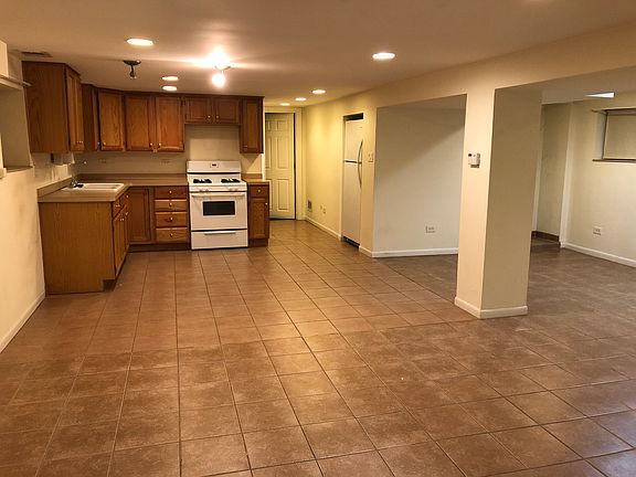 Open floor plan includes central heating and air conditioning system. Separate hot water heaters for each unit. Coin Laundry facilities in rear of home. Large back yard.