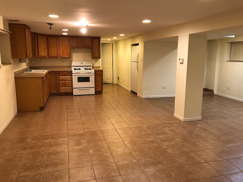 Open floor plan includes central heating and air conditioning system. Separate hot water heaters for each unit. Coin Laundry facilities in rear of home. Large back yard.
