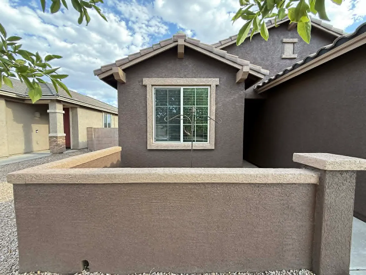 Building Photo - 10450 S Cutting Horse Dr