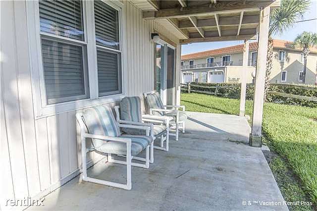The covered patio is a great place to sit, read, and drink.