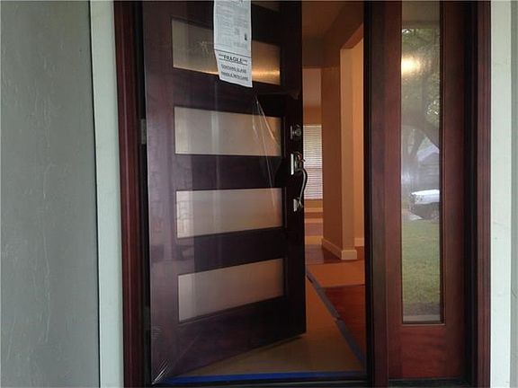 New Front Entry Contemporary/Modern Door (New owner may peel plastic wrap off new intalled door)