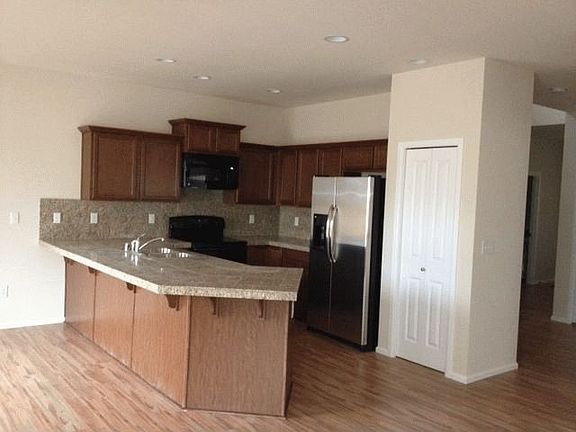 Kitchen with Stainless Refrigerator