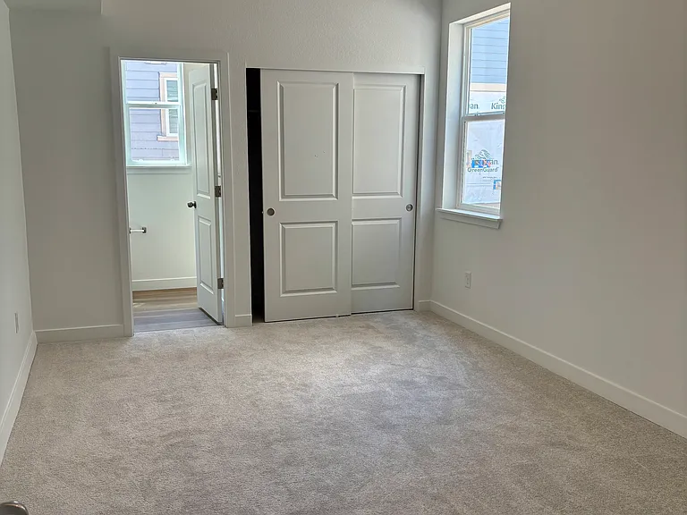 lower level bedroom/study with private bath