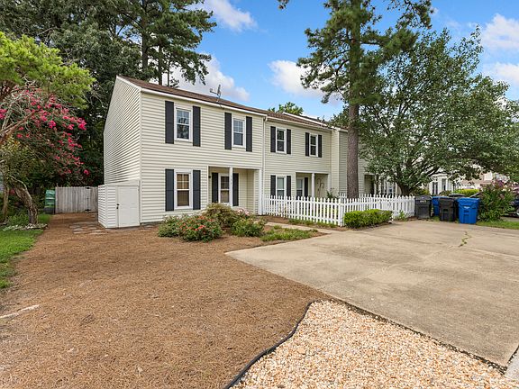 No Lawncare Required, Stoned Walkway to Large Fenced-in Backyard