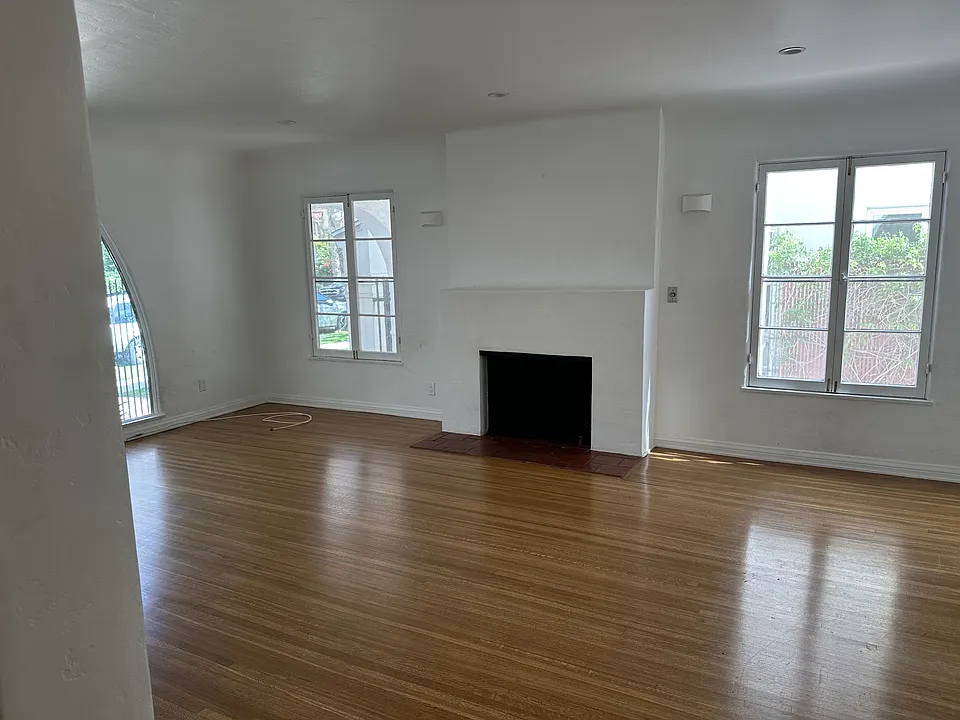 Living room with wood burning fireplace