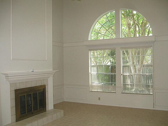 DRAMATIC TWO STORY LIVING AREA W/ WBFP!