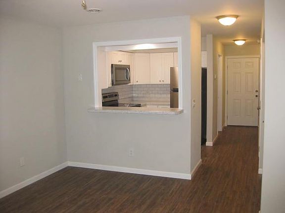 Living room facing the kitchen