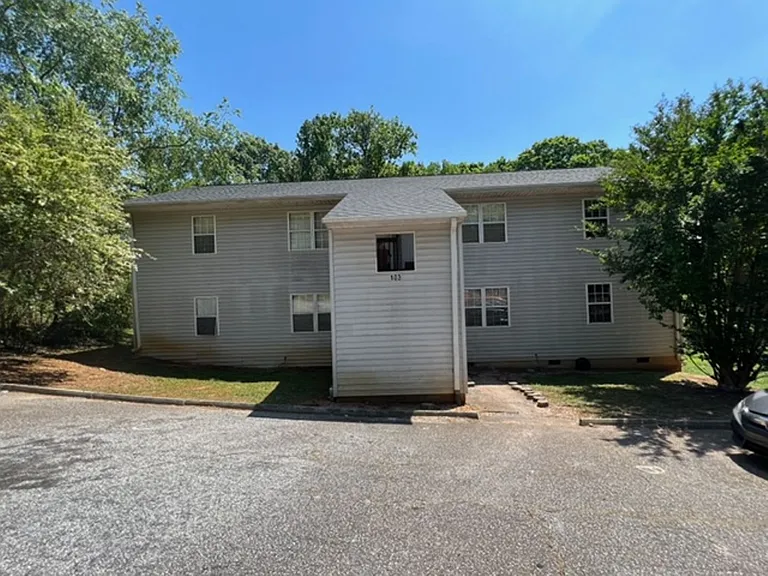 This spacious unit of a Quadplex has 2 BR and 1 Full Bath. Move In Ready! — Photo 1