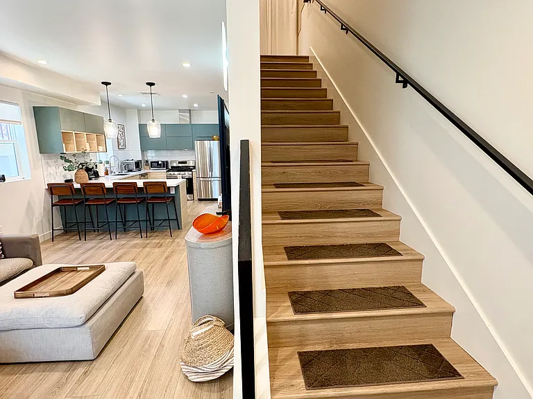 Living room, kitchen, stairs to the third floor.
