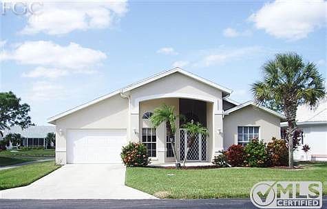 A VERY NICE HOME WITH A TERRIFIC VIEW OF LAKE AND GOLF COURSE AT A GOOD PRICE.