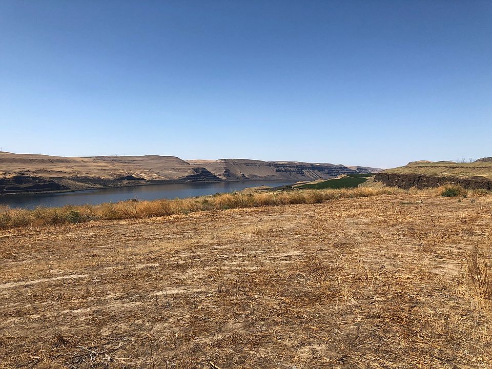 Large graded lot, river view