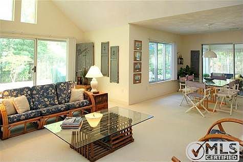 From the Living Room, one can see the Dining Room and Sun Porch