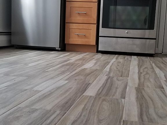 Kitchen with wooden porcelain tile