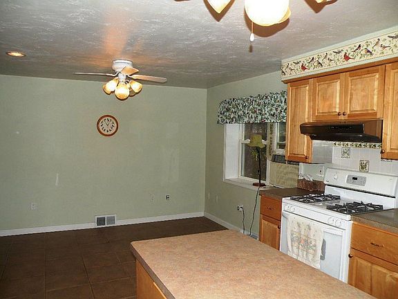 Eating area. Nice views to backyard (partially fenced).