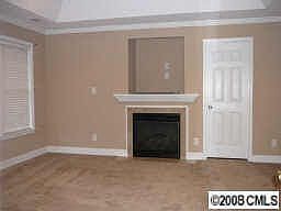 Mastersuite has gas log Fp, dual sinks, garden tub & sep. shower