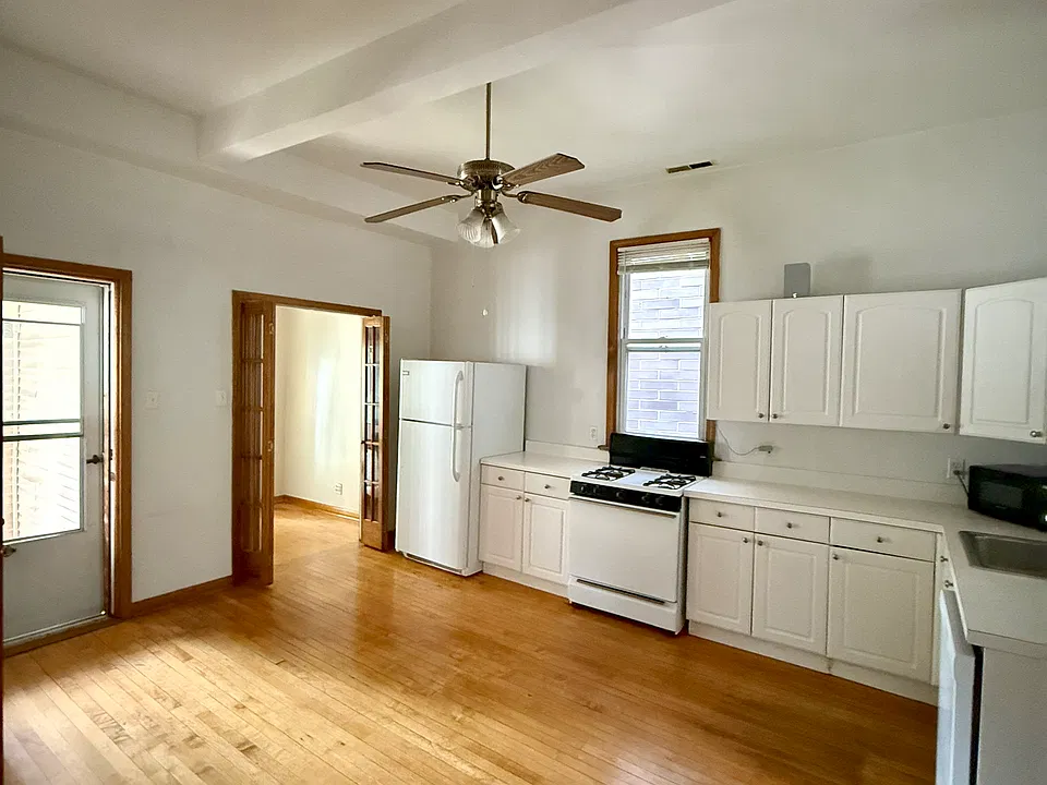 Large open kitchen, fridge, stove, and dishwasher