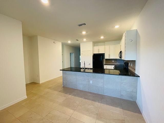Modern kitchen/open concept dinning area.
