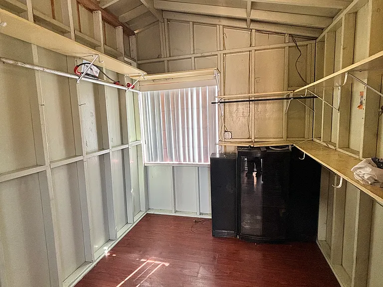 Storage room located directly outside the entrance.