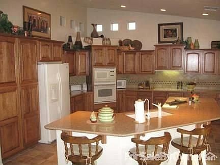 Living Room and Dining Room
						:
						Spacious living room and dining room area provides comfortable setting for both