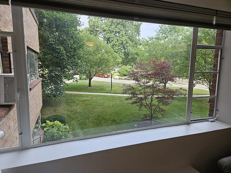 Nice landscaped view through large windows.