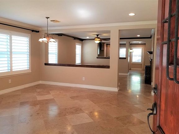 View from front door, through dining room, to kitchen.
