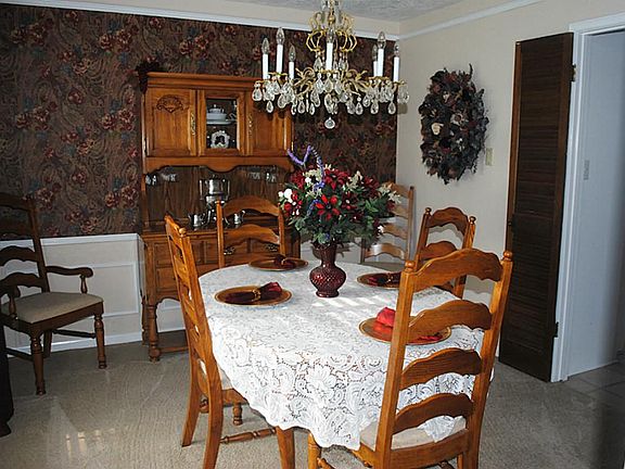 As you enter this home, the formal dining greets you on the left. Lots of natural light streams into