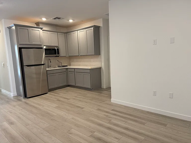 Another angle of the kitchenette and dining area.