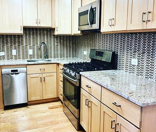 Kitchen with stainless steel appliances and plenty of storage and counter space!