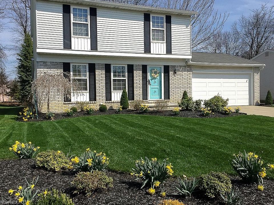 Beautiful lush green lawn, shrubs, and automated irrigation system installed in 2014 of this magnificent colonial located at 507