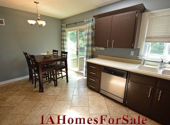 Kitchen-

Sliding glass door leads to backyard deck.